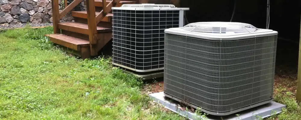 Heat pump installation and service units outside a home in Lexington, MA
