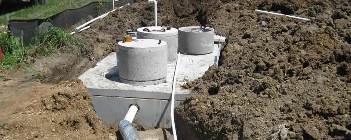 Septic system repair and installation site with tank access ports in Lexington, MA